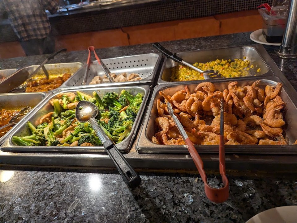 Menu page showing buffet and sushi sections.
