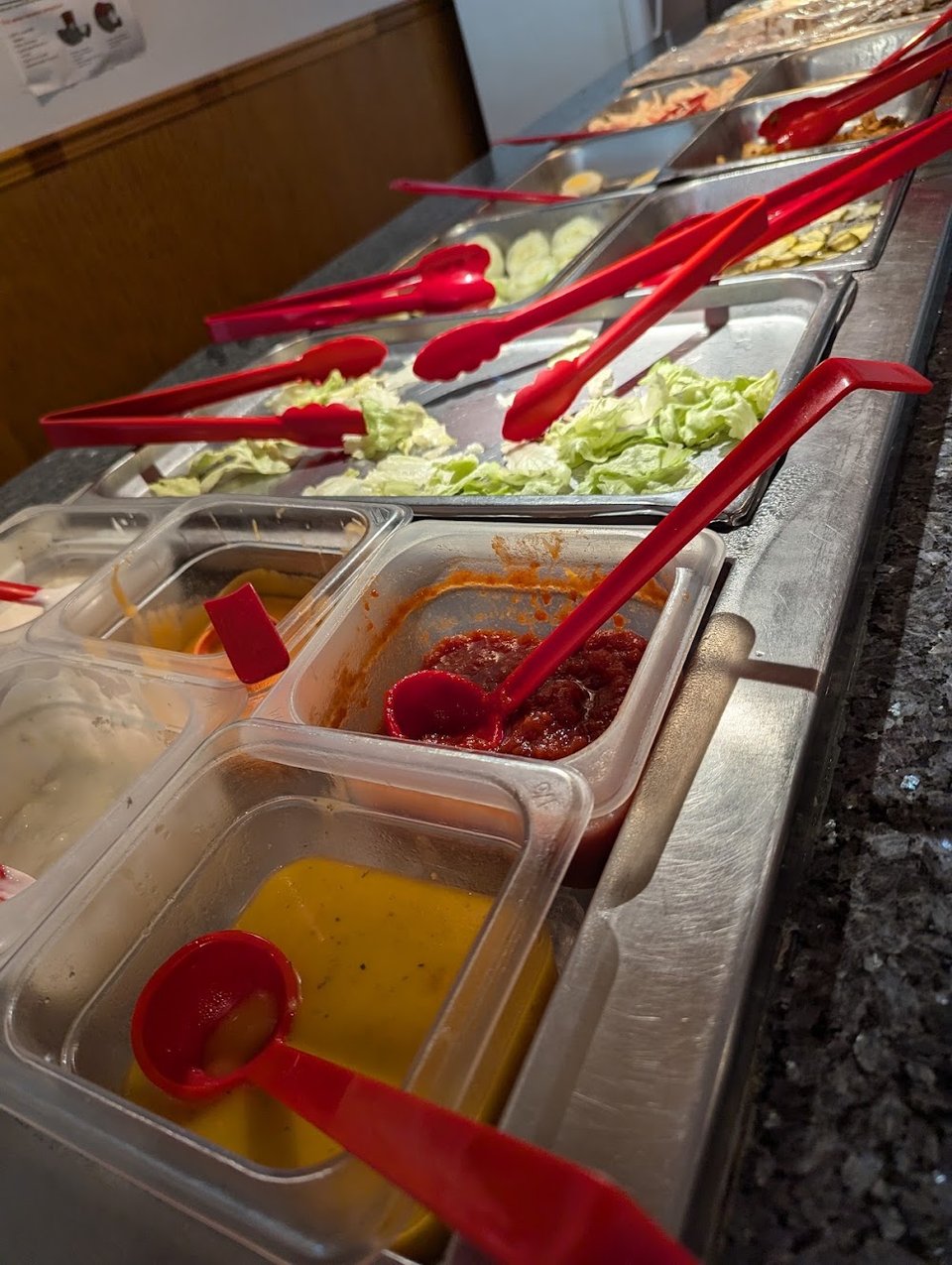 Menu layout featuring raw and cooked sushi selections.
